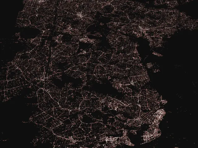 Dark map of the state of Rio de Janeiro formed by millions of luminous dots, each representing an active company registration